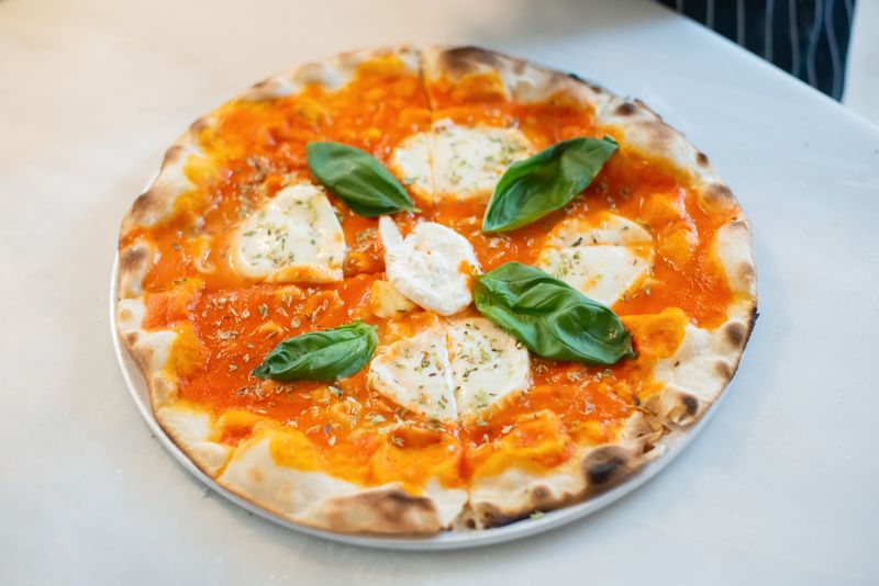 Papa Ginos signature pizza — papa gino's authentic Italian recipe